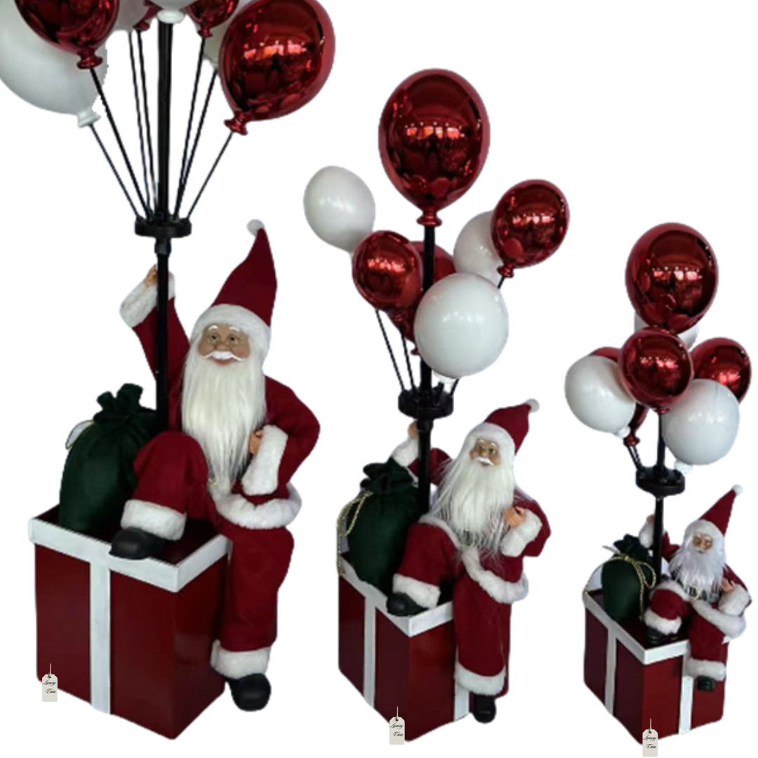 Santa Sitting on Gift Box with Balloons – Christmas Decoration Luxury Casa